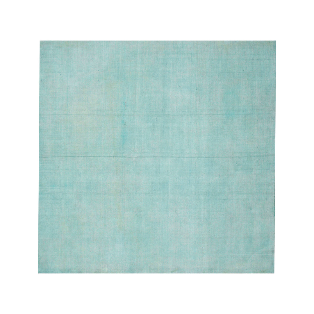 Light blue textured paper on a white background