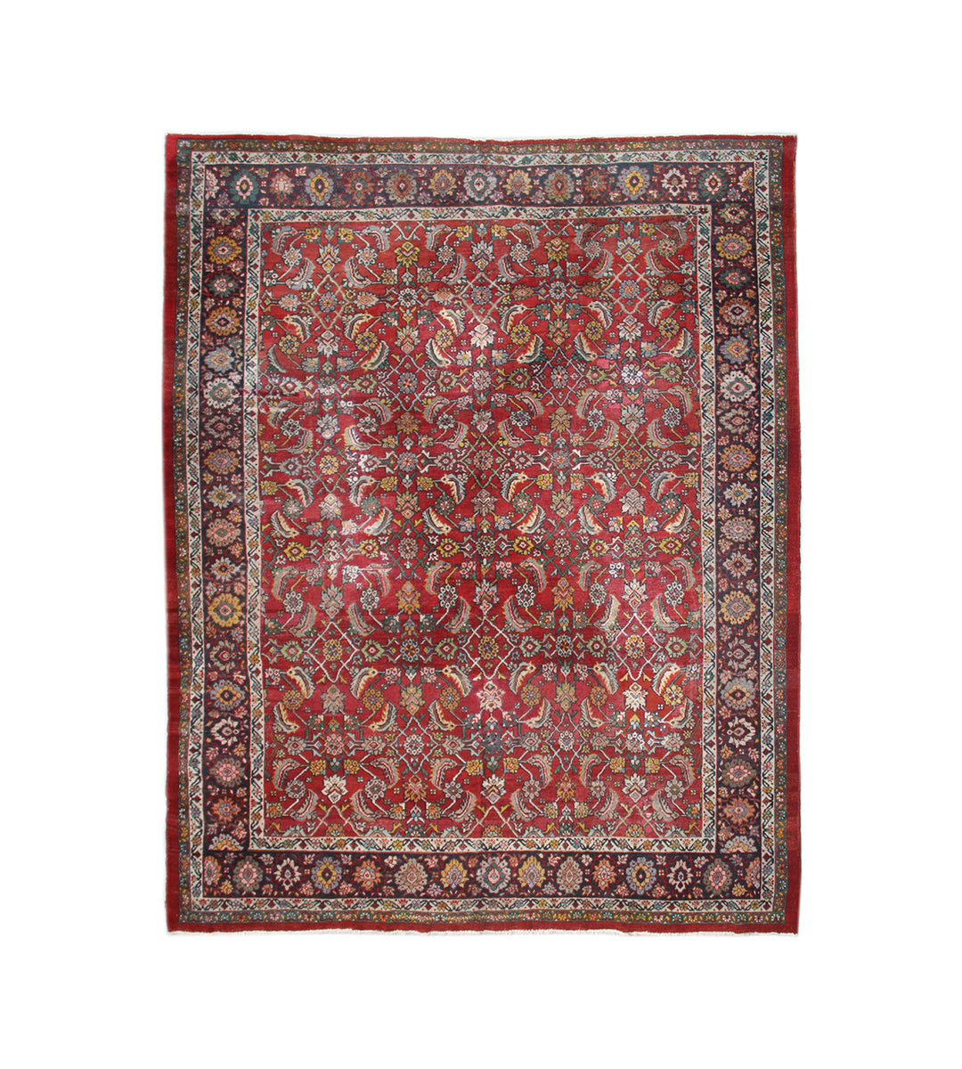 Antique 10x12 Persian Mahal wool rug featuring a red background, blue accent tones, and an allover Herati design with authentic vintage wear.