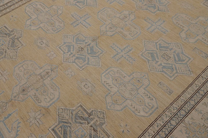 Close-up of a patterned floor with geometric designs on a beige background