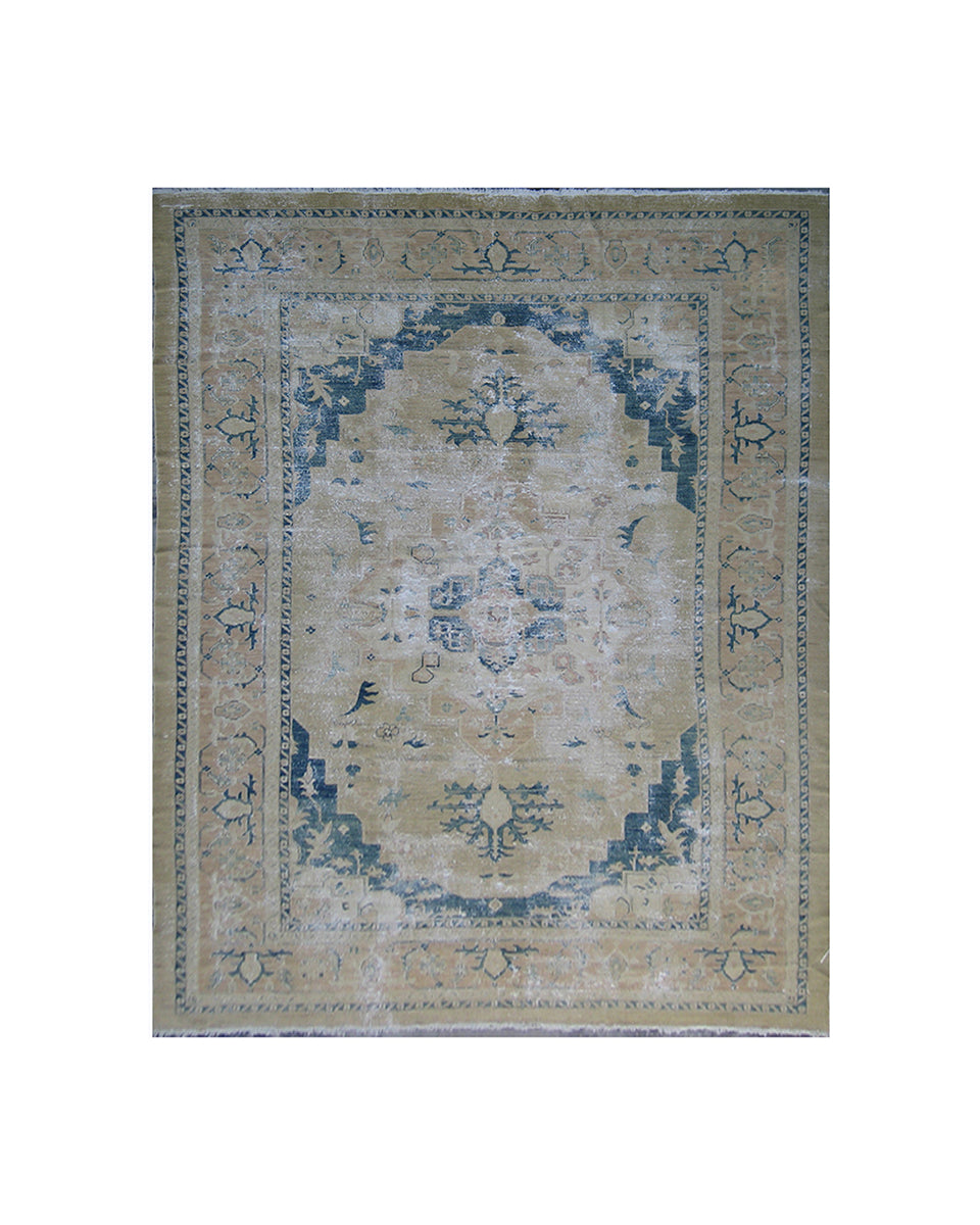 Rug with a vintage design featuring blue and beige colors on a white background