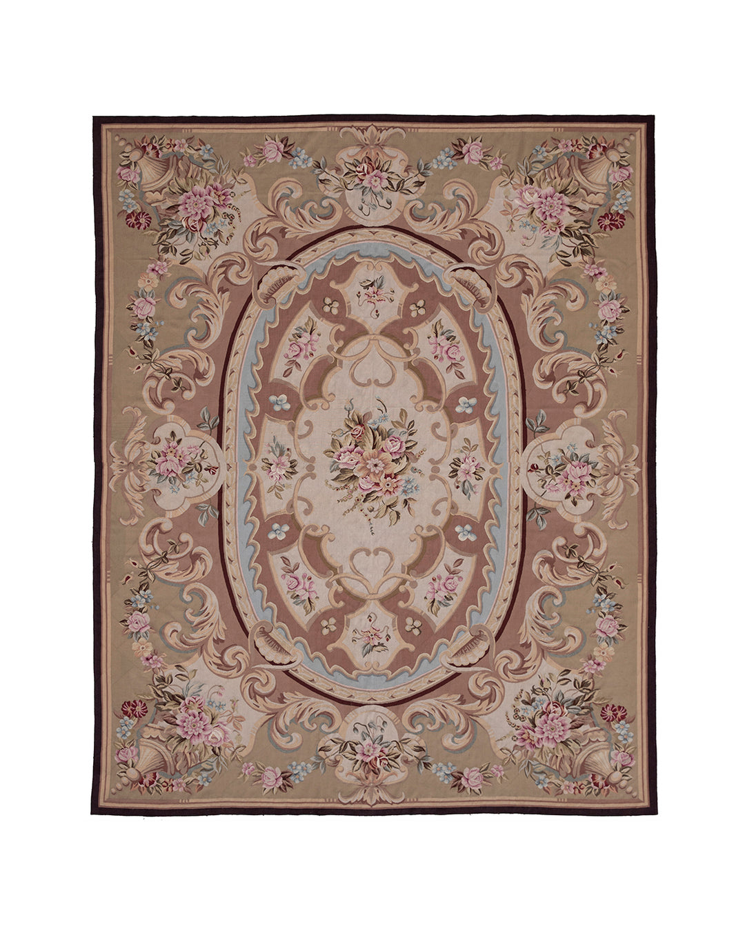 An ornate traditional area rug with a floral and scroll pattern in beige, brown, pink, and light blue, featuring a dark brown border.