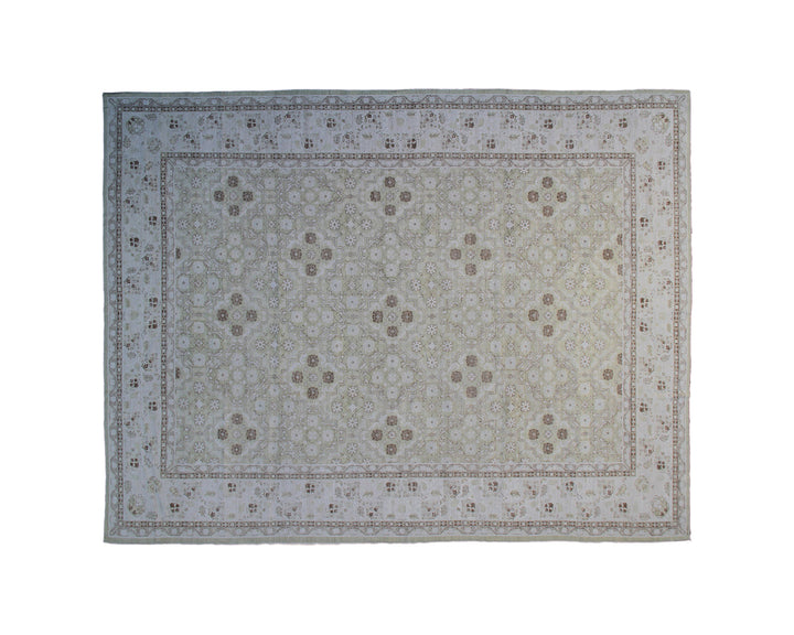 A rectangular area rug with a traditional floral pattern in muted gray, beige, and brown tones, shown flat against a plain white background.