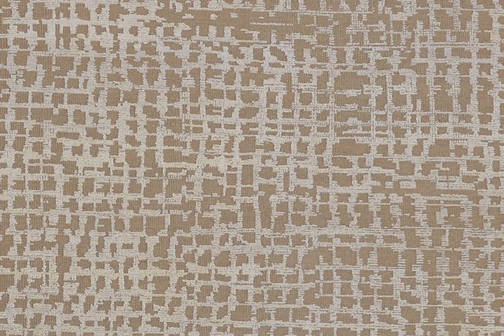 Textured patterned fabric swatch in beige and brown tones