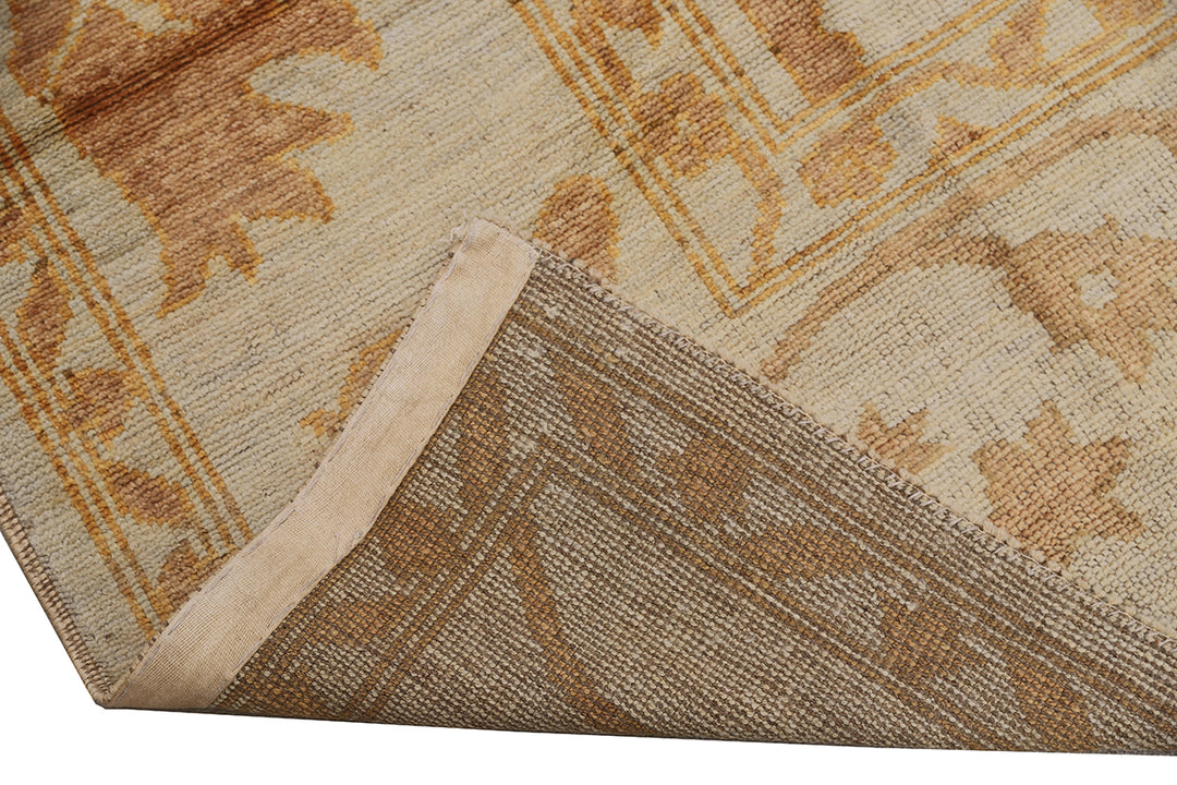 10x14 luxury hand-knotted soft yellow gold Oushak style rug by Ariana Rugs West Hollywood
