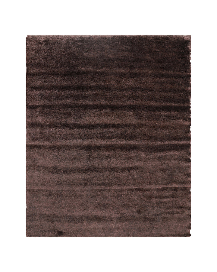 Brown textured rug on a white background