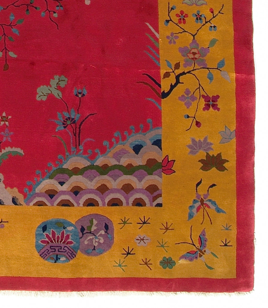Decorative fabric with floral and wave patterns on a red and yellow background