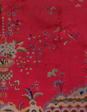 A 10x14 vintage Chinese Art Deco rug in perfect condition with a vibrant red field, gold borders, and hand-knotted dragon, butterfly, and lantern motifs.
