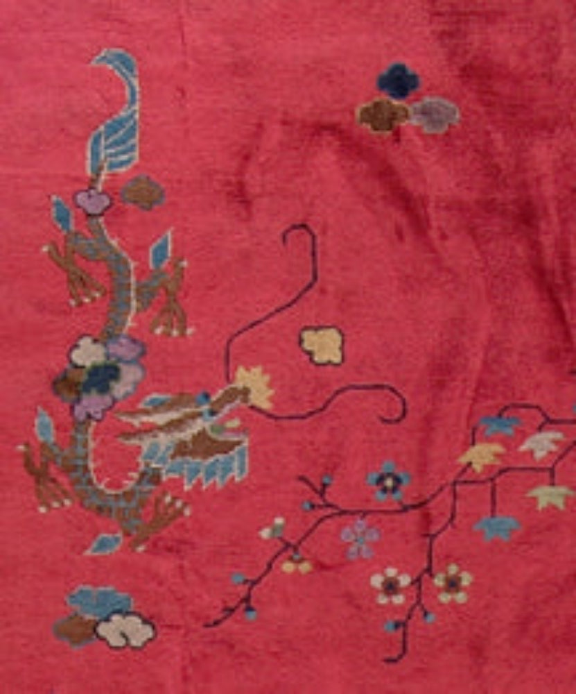 A 10x14 vintage Chinese Art Deco rug in perfect condition with a vibrant red field, gold borders, and hand-knotted dragon, butterfly, and lantern motifs.