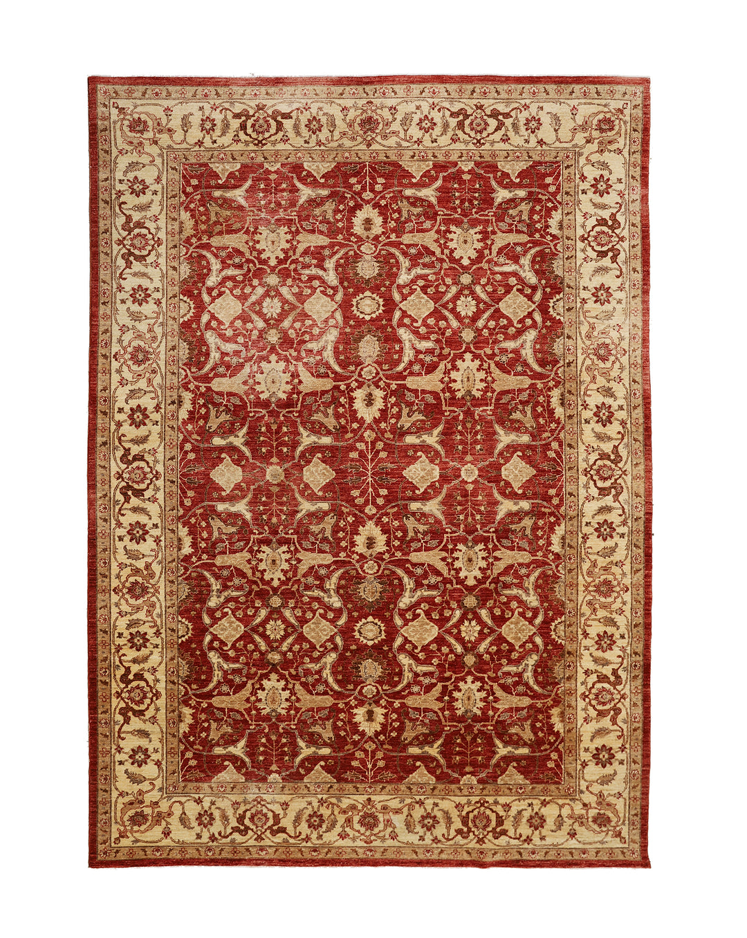 Decorative red and beige patterned rug on a white background