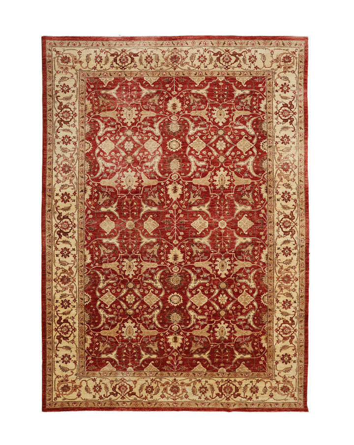 Decorative red and beige patterned rug on a white background