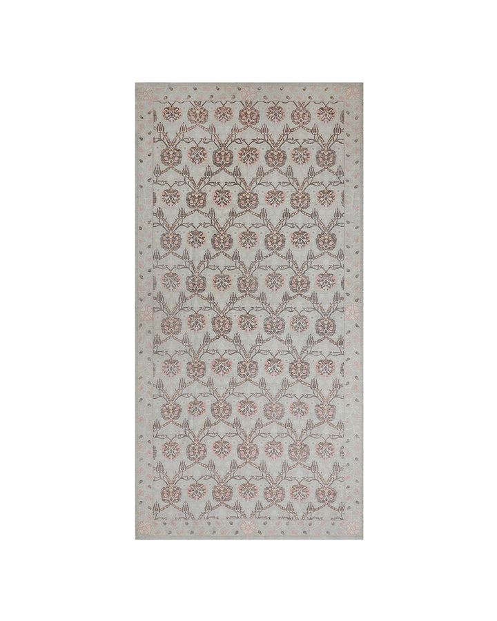 Decorative rug with floral pattern on a white background