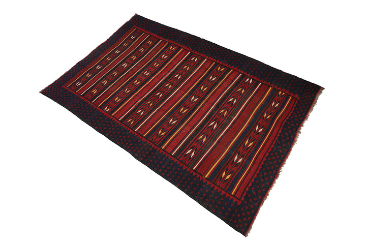 Red and black patterned rug 