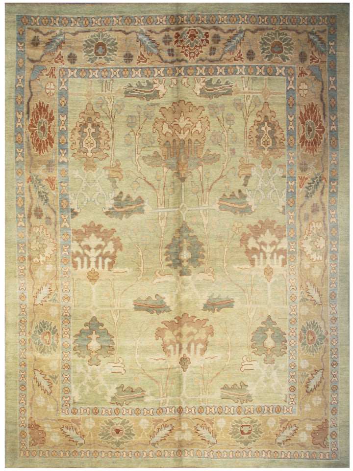 A hand-knotted Turkish rug with a floral Arts and Crafts design in shades of green, gold, terracotta, and yellow.