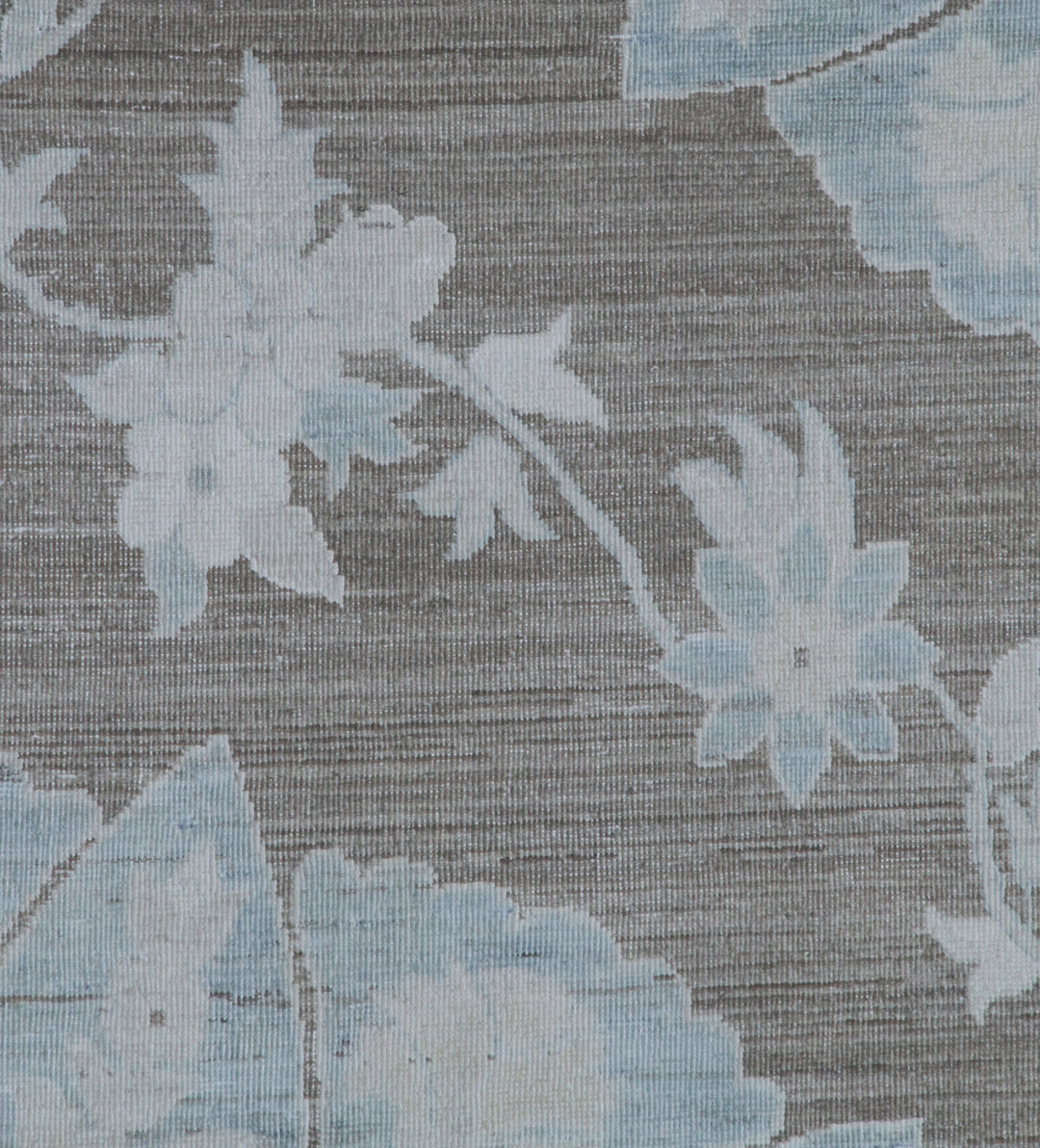 Floral pattern on a textured rug background