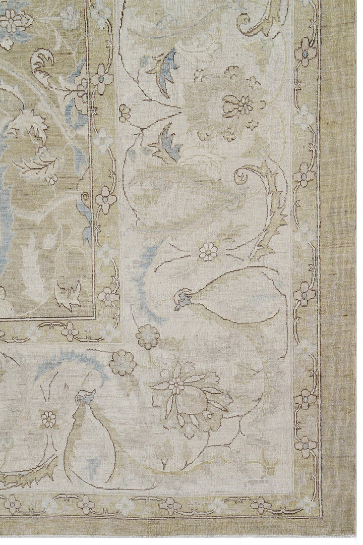 A fine silk and wool polonaise design rug with a floral pattern in beige and blue tones.