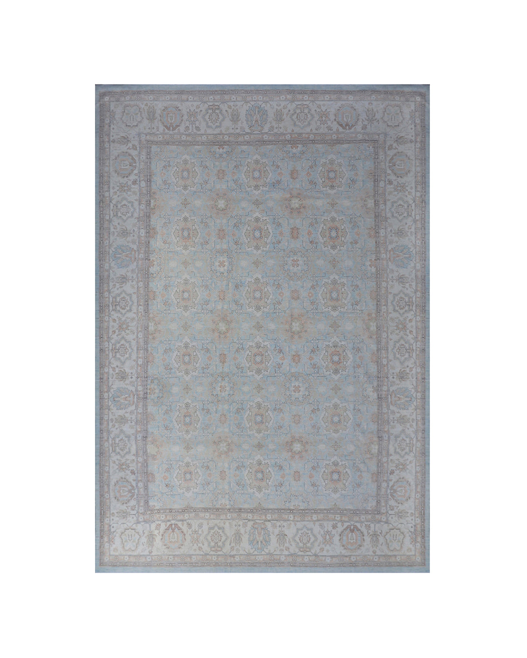A rectangular area rug with a traditional medallion pattern in muted shades of blue, beige, and gray, shown flat against a white background.