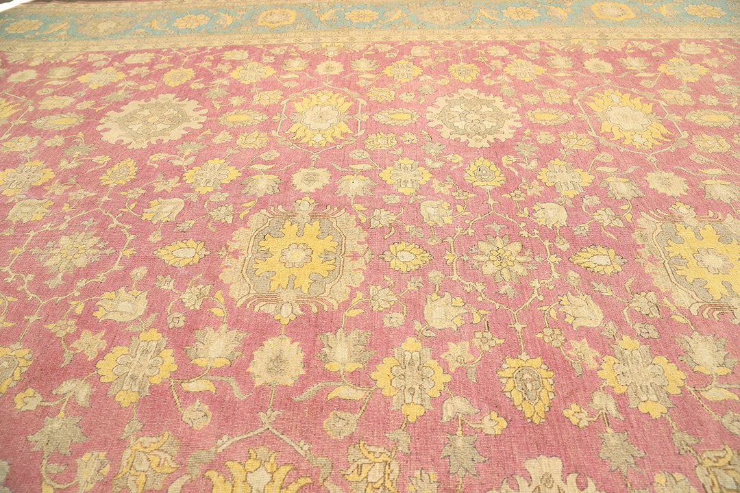 12x18 luxury hand-knotted Afghan Sultanabad rug with hot pink field and blue floral border by Ariana Rugs West Hollywood
