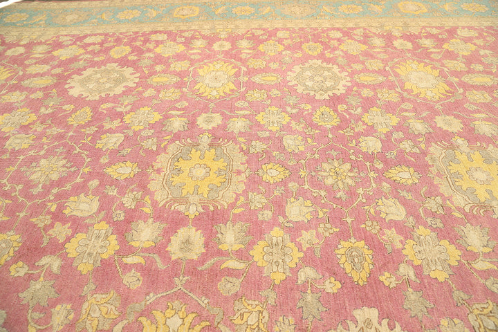 12x18 luxury hand-knotted Afghan Sultanabad rug with hot pink field and blue floral border by Ariana Rugs West Hollywood