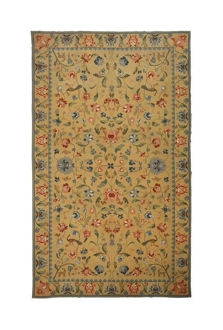 Decorative floral rug with a beige background