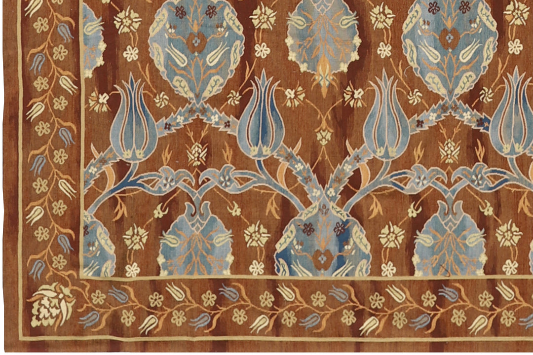 An oversized near-square 15x16 handwoven wool flatweave rug from the Ariana Kilim Collection, featuring a classic brown and beige Ottoman Aubusson medallion design.