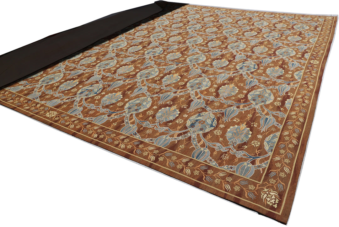 An oversized near-square 15x16 handwoven wool flatweave rug from the Ariana Kilim Collection, featuring a classic brown and beige Ottoman Aubusson medallion design.