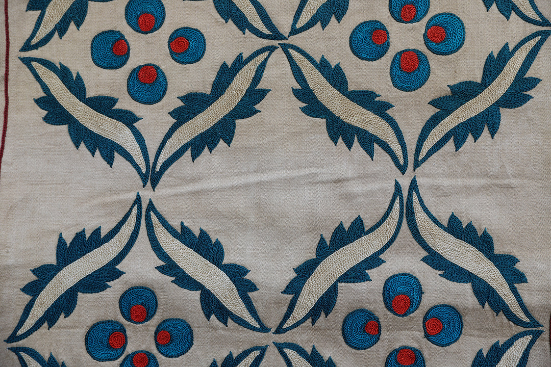 Unique 17x17 Uzbek hand-embroidered silk-on-cotton teal Suzani cushion cover from a trusted dealer with over 45 years of experience.