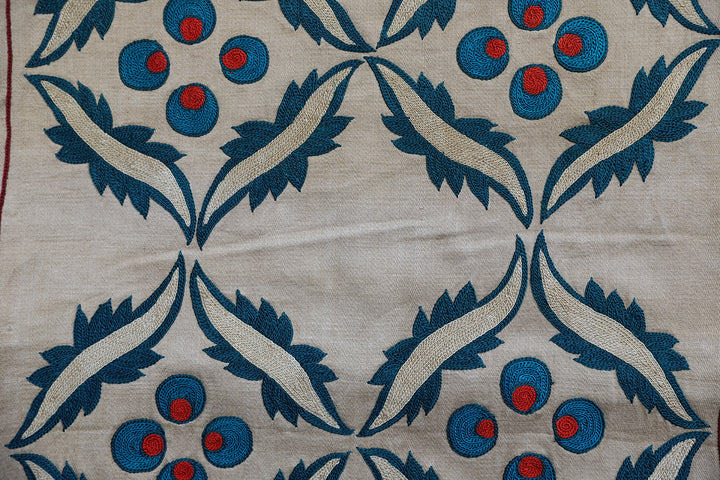 Unique 17x17 Uzbek hand-embroidered silk-on-cotton teal Suzani cushion cover from a trusted dealer with over 45 years of experience.