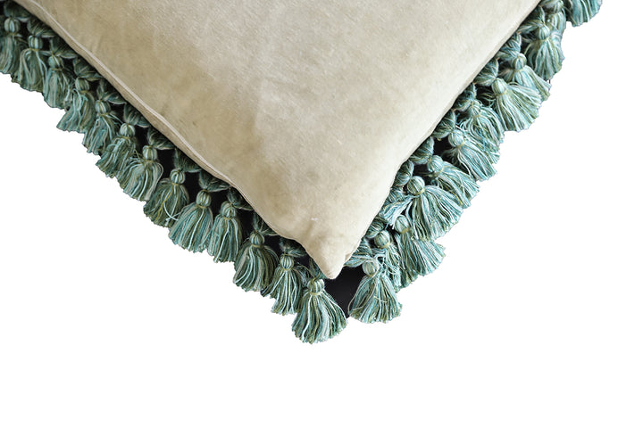 Handcrafted 18x21 brown floral wool accent cushion with white decorative tassels by Ariana Rugs.