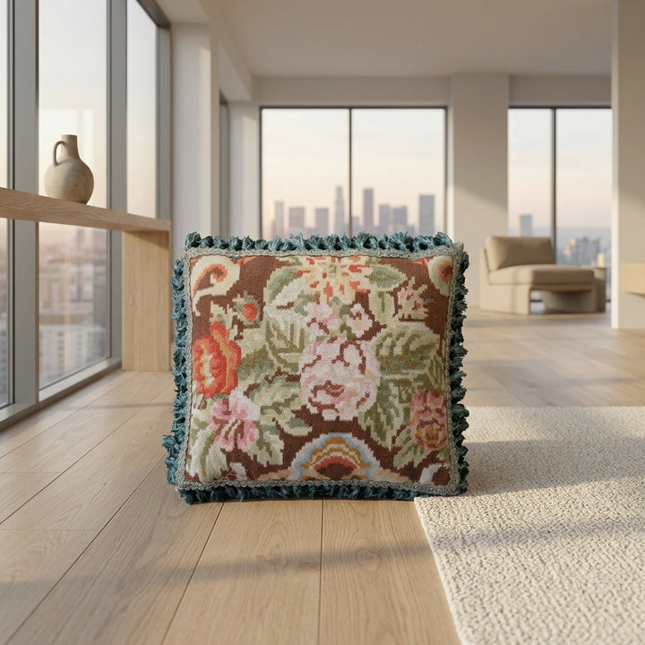 Handcrafted 18x21 brown floral wool accent cushion with white decorative tassels by Ariana Rugs.