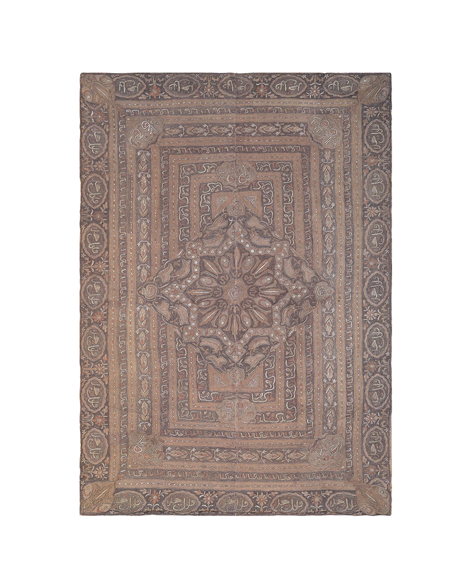 Decorative rug with intricate patterns on a white background