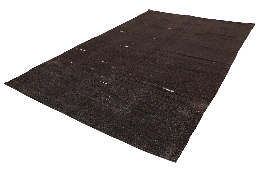 7'x11' Vintage Turkish Black Goat Hair Rug – Handwoven Minimalist Masterpiece