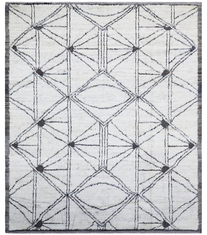 An 8'x10' rug with a geometric Moroccan style in ivory and brown shades, featuring a diamond pattern and intricate line details.