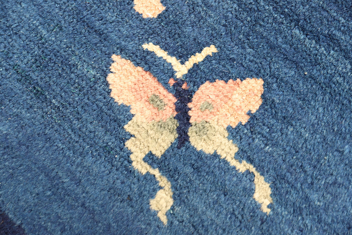 Butterfly design on a blue textured surface