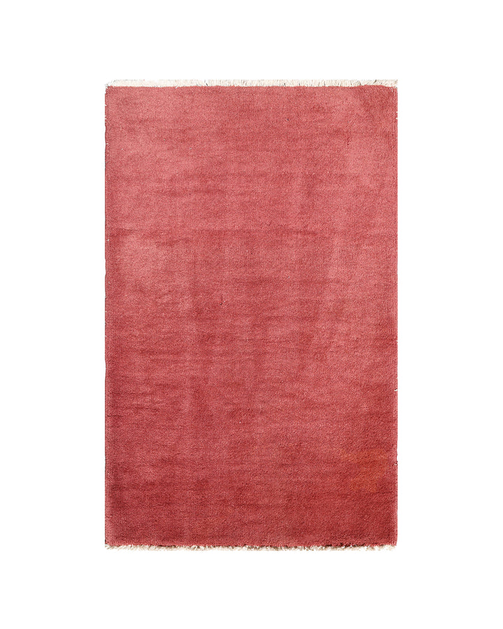 Red rug on a white background