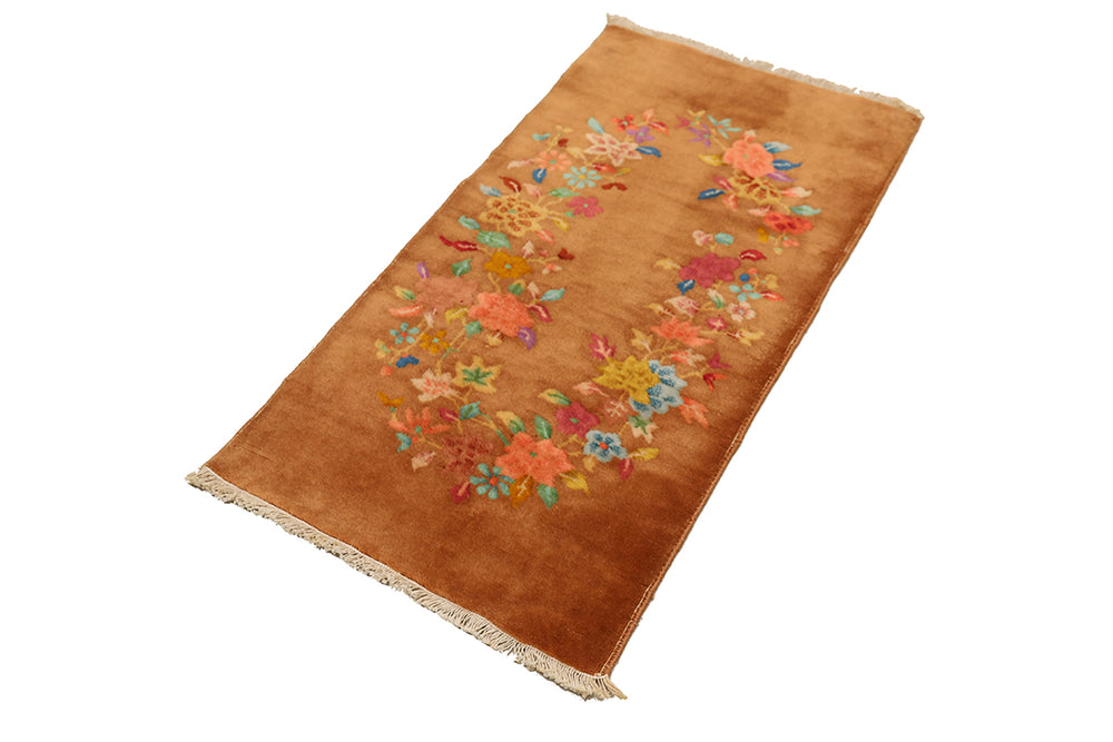 Brown rug with floral patterns