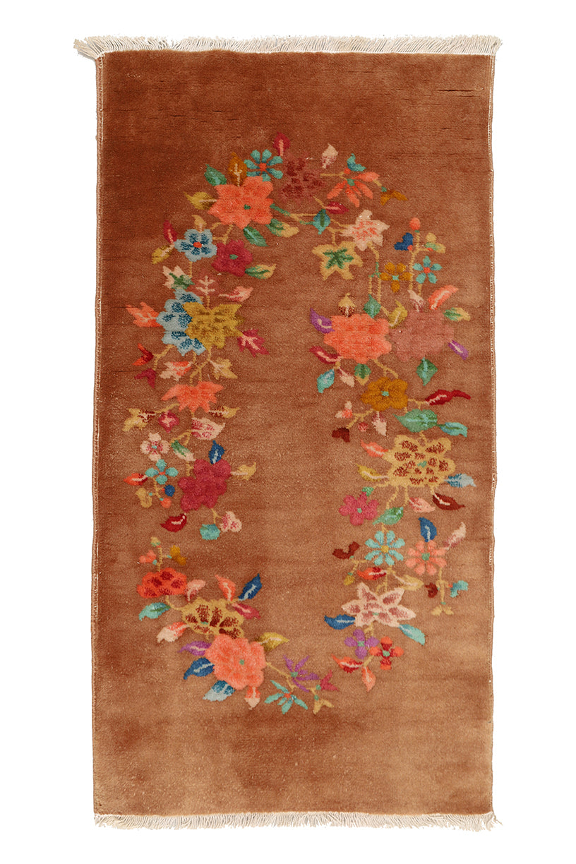 Brown rug with colorful floral Pattern
