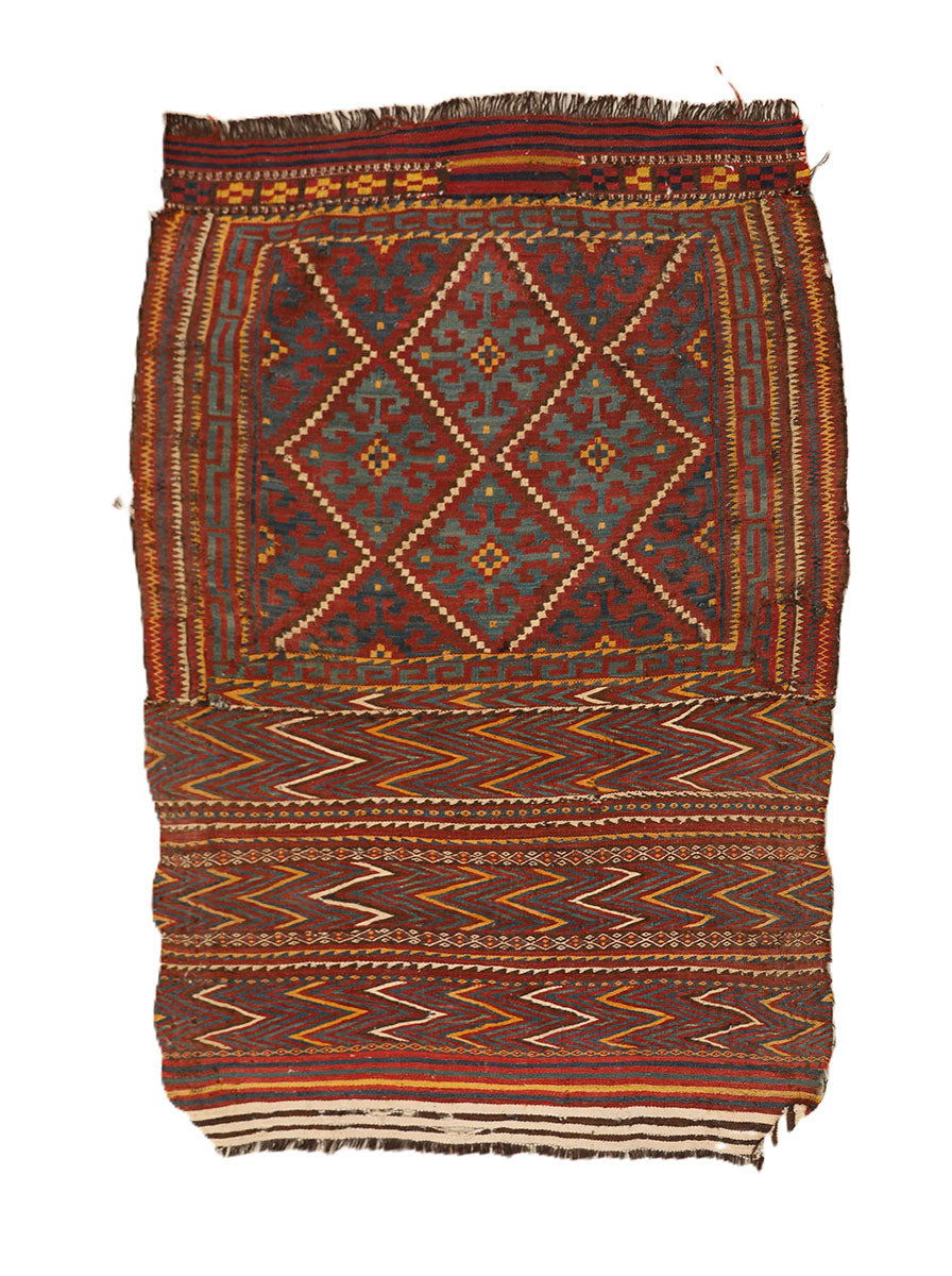 Woven textile with geometric patterns on a white background