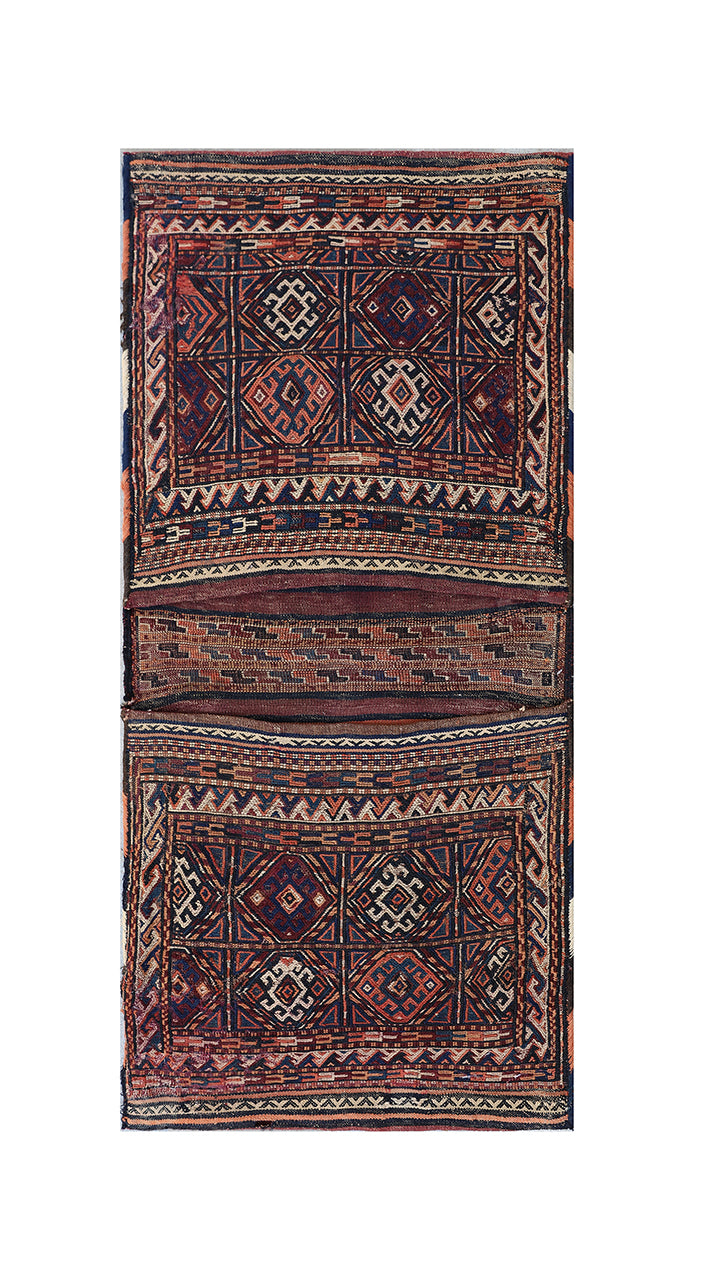 Traditional patterned fabric with geometric designs on a white background