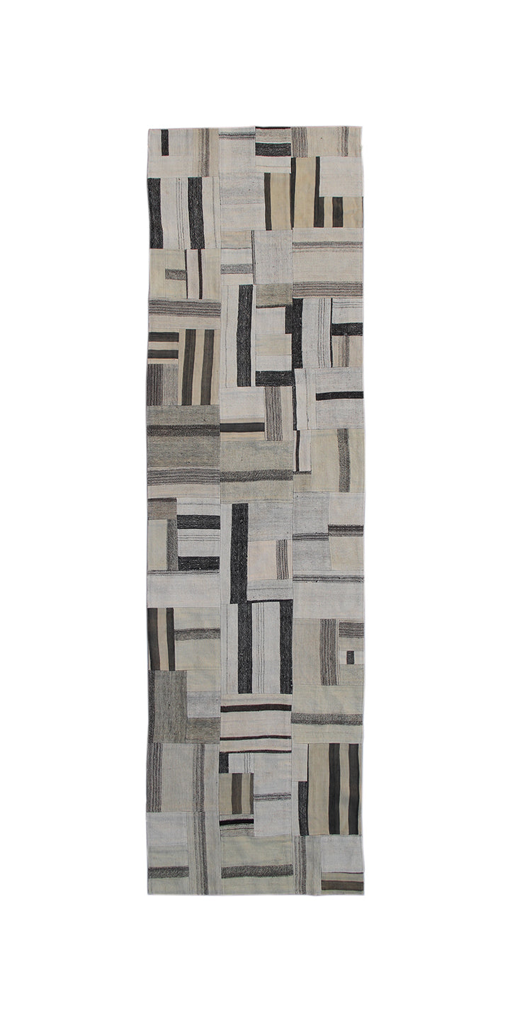 Rectangular area rug with geometric pattern on a white background
