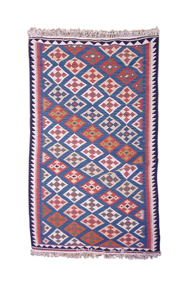 Decorative rug with geometric pattern on a white background