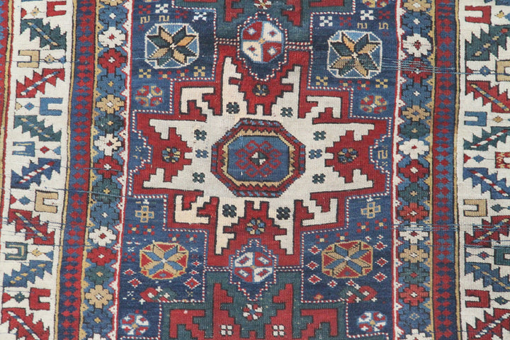 Unique 3x6 antique Caucasian Cuba tribal rug in blue, red, and white from a trusted dealer with over 45 years of experience.