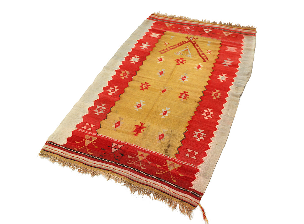 Decorative rug with red and beige pattern