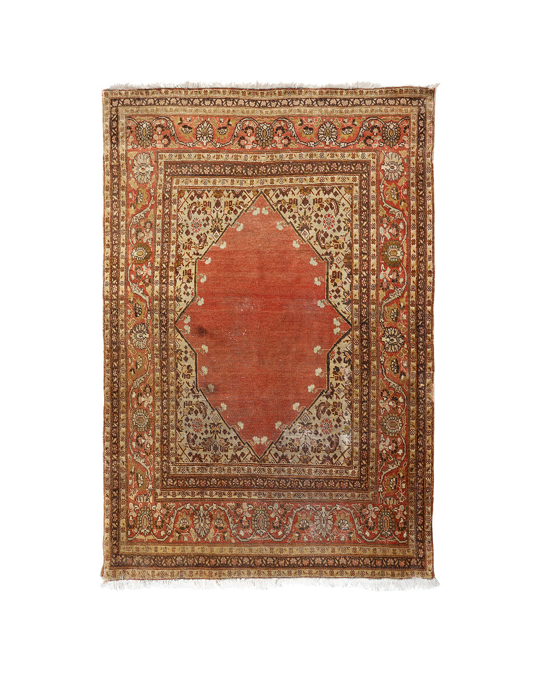 A traditional oriental rug with a central rust-red diamond medallion, surrounded by intricate floral motifs in beige, brown, and muted blue on a white background.