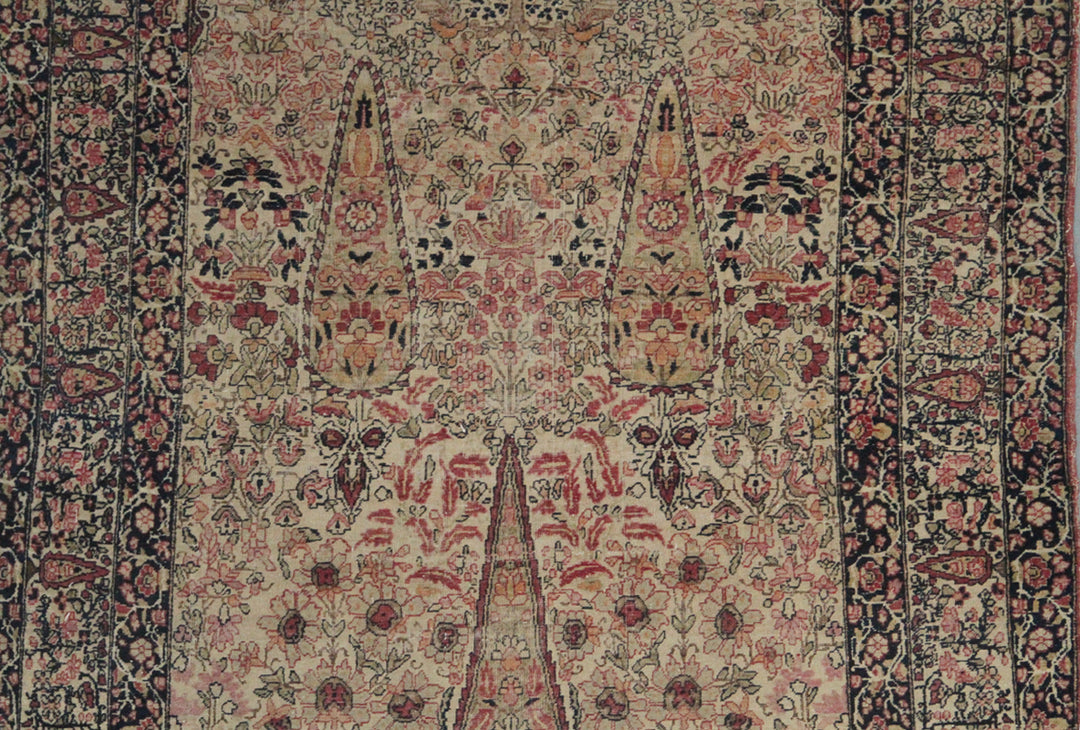 7.02 x 4.04 19th century antique Persian Kermanshah rug depicting a garden scene with a central Tree of Life motif.