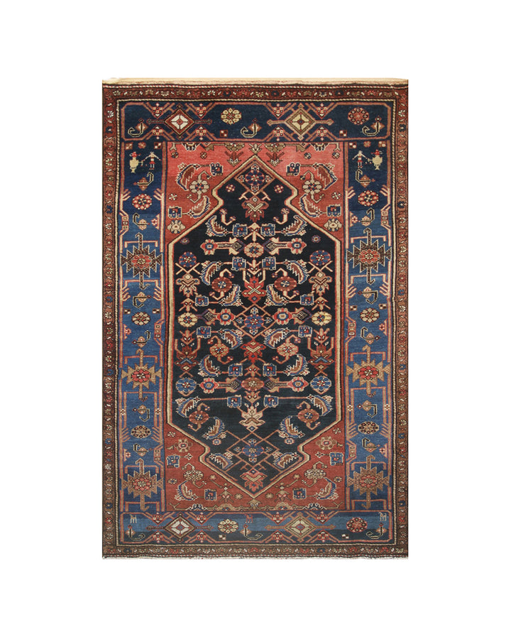 A traditional oriental-style area rug with a dark navy blue central field, red borders, and blue side panels with intricate floral and geometric patterns.