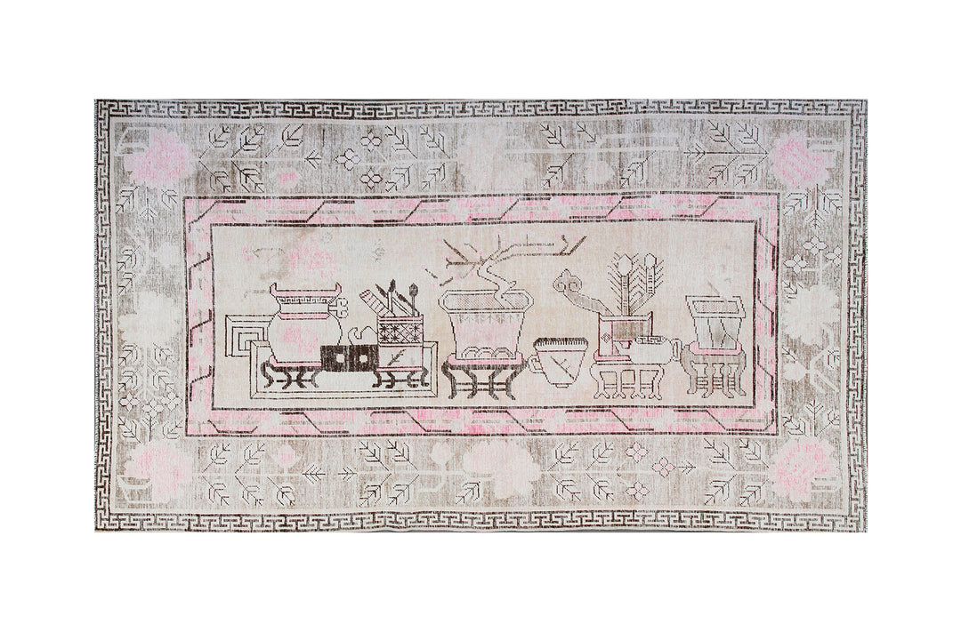 Semi-antique Samarkand Yarkand rug featuring a sideways vase motif with wildflowers in soft pastel tones