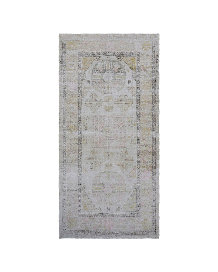 Rectangular rug with a geometric pattern on a white background