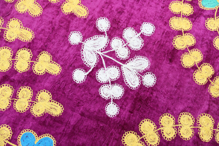 8'x10' Finely stitched Uzbek Suzani Textile Boasting a Vibrant Magenta Velvet Backdrop