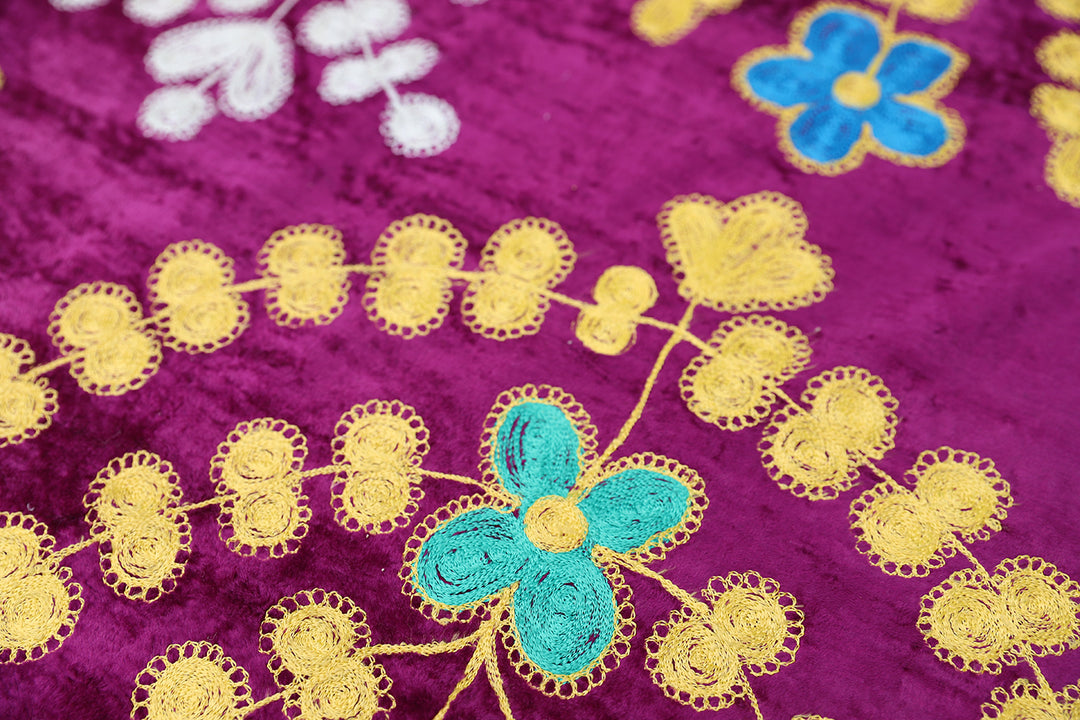 8'x10' Finely stitched Uzbek Suzani Textile Boasting a Vibrant Magenta Velvet Backdrop