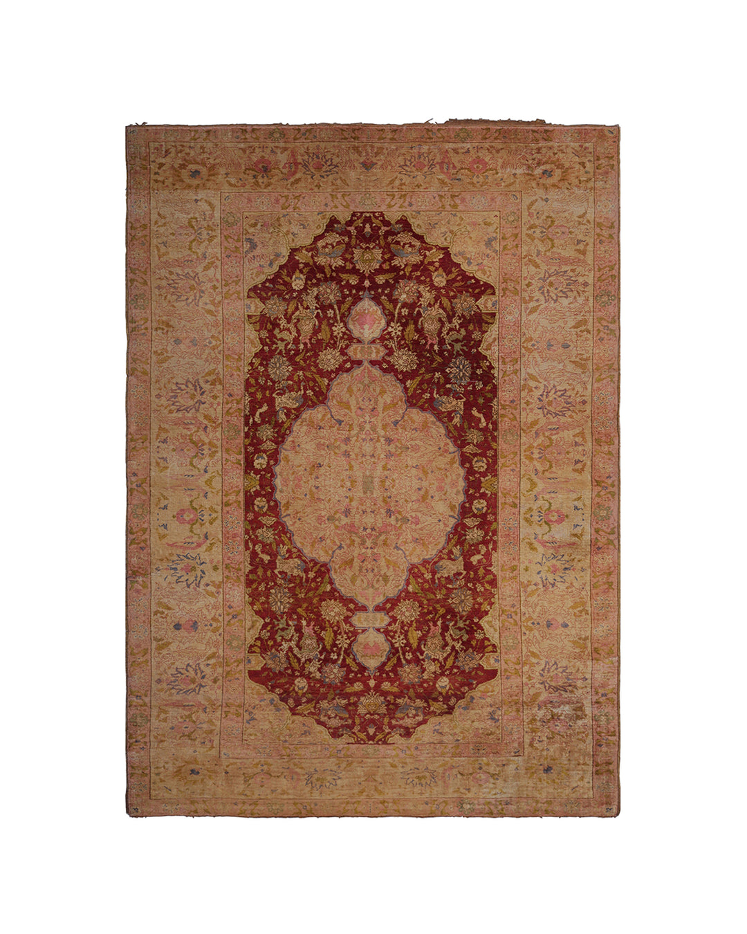 Vintage-style rug with intricate design on a plain background
